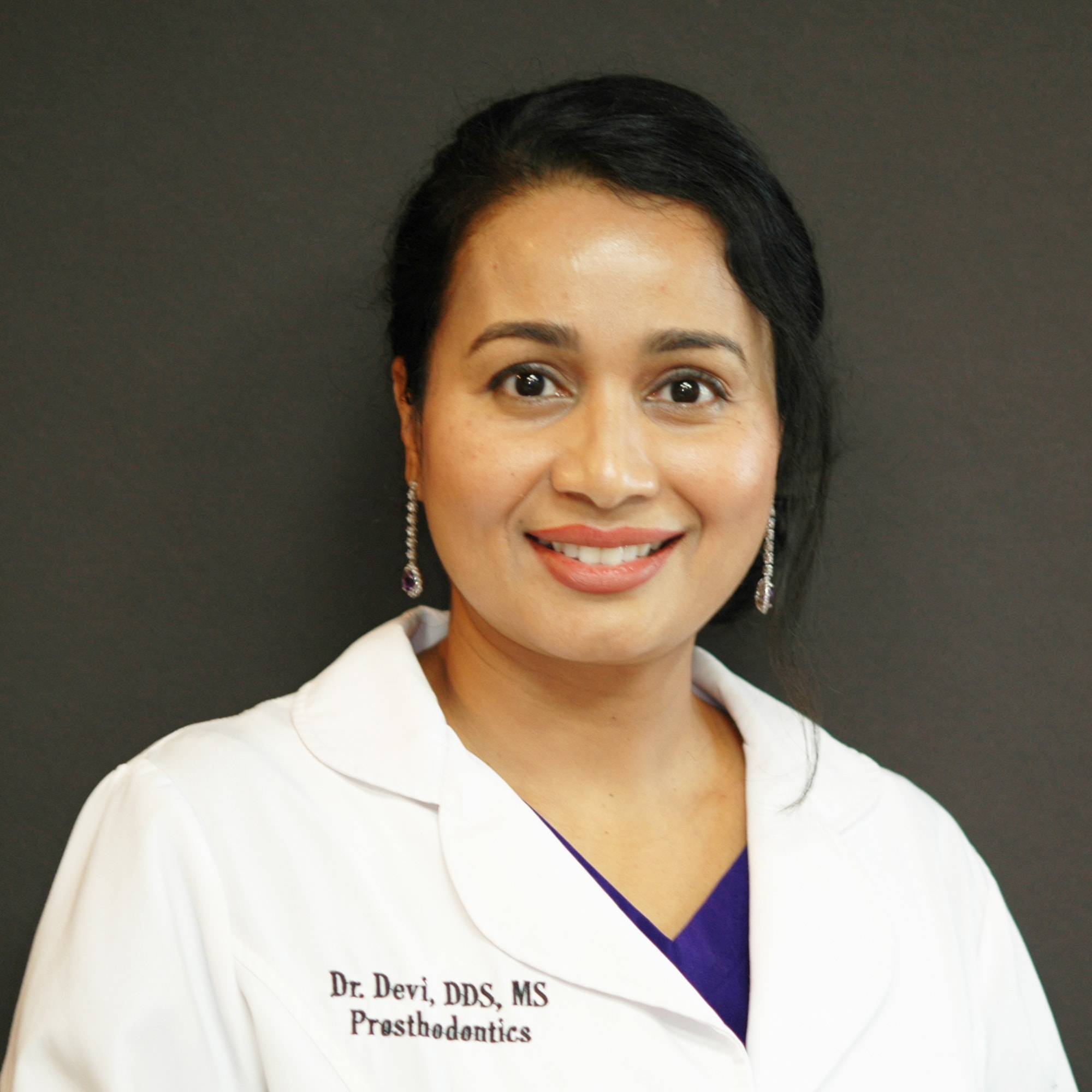 Dr. Devi, DDS.MS DDS, MS, FICOI